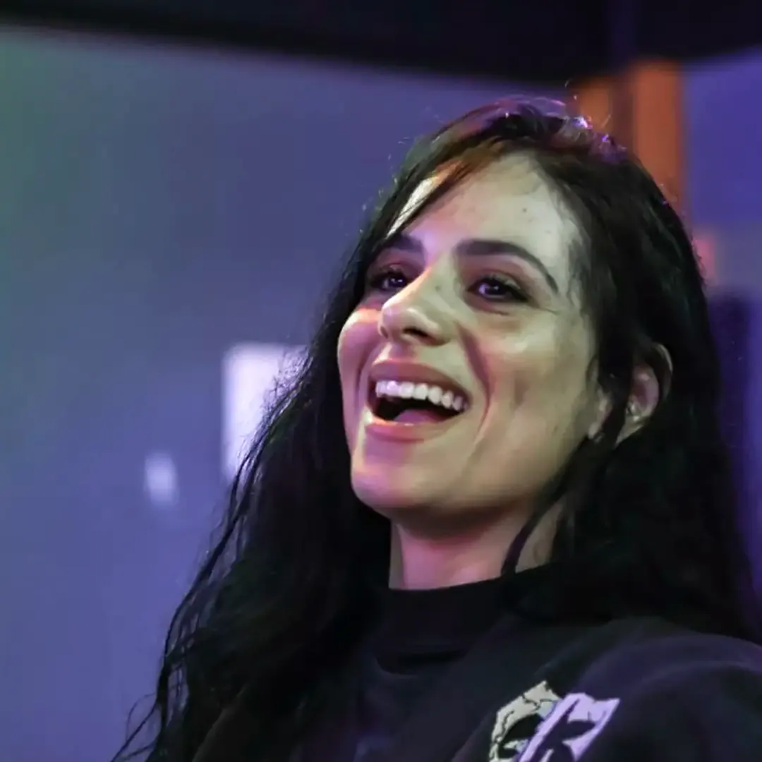 Aninha sorrindo no tatame